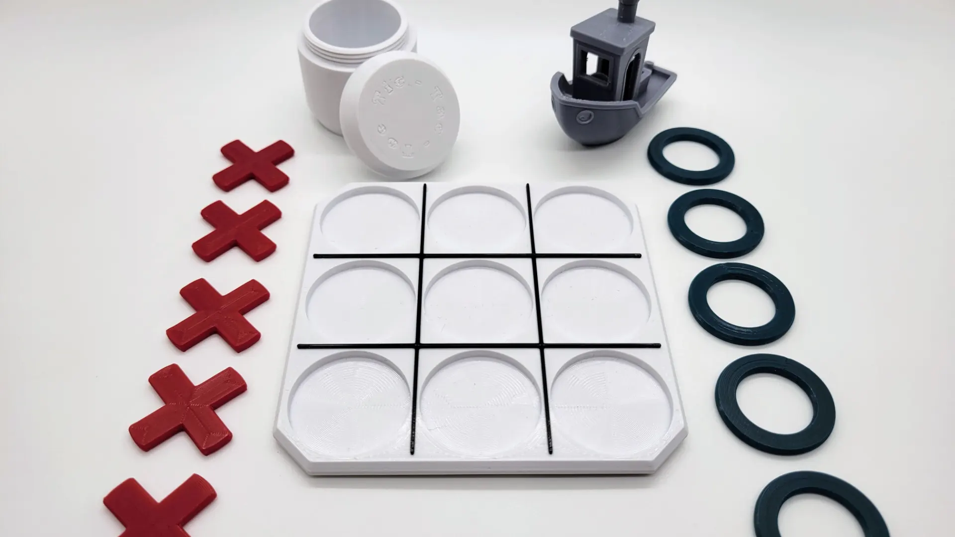 A render of 3d printed tic tac toe board with pieces and a storage container