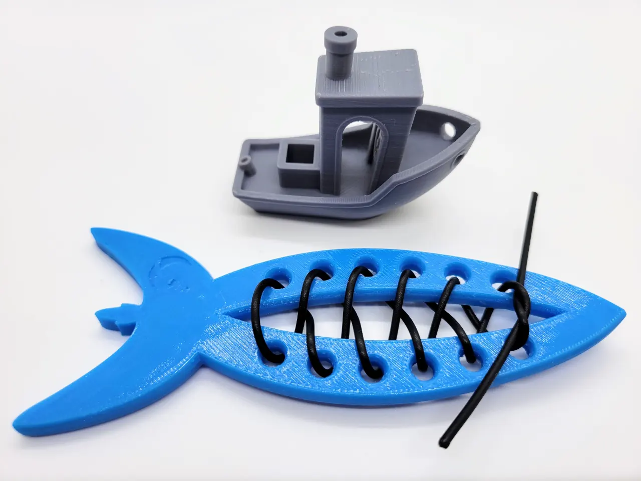 A render of a 3d printed educational toy shaped like a rocket for teaching children to tie