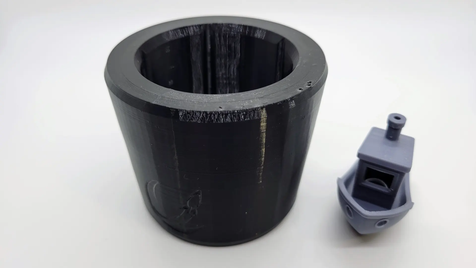 A render of a parametric customizable 3d printed cup holder adapter