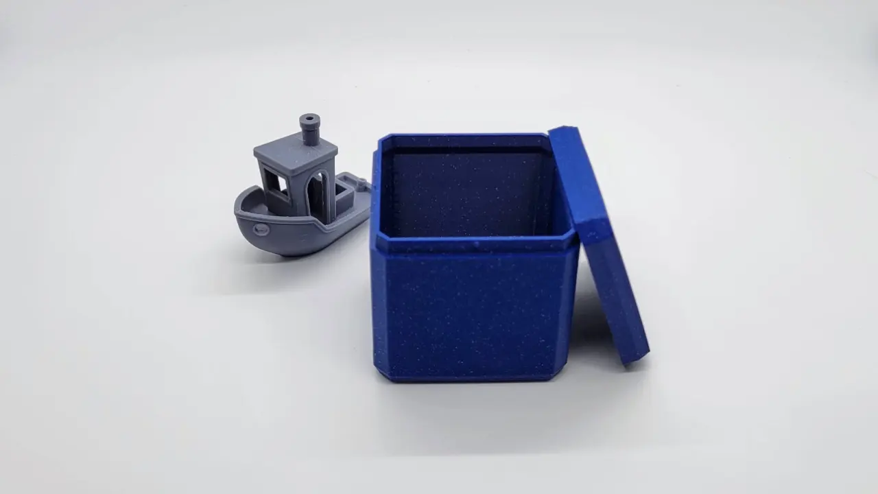 A render of a customizable parametric 3d printed stackable storage container with snap closure