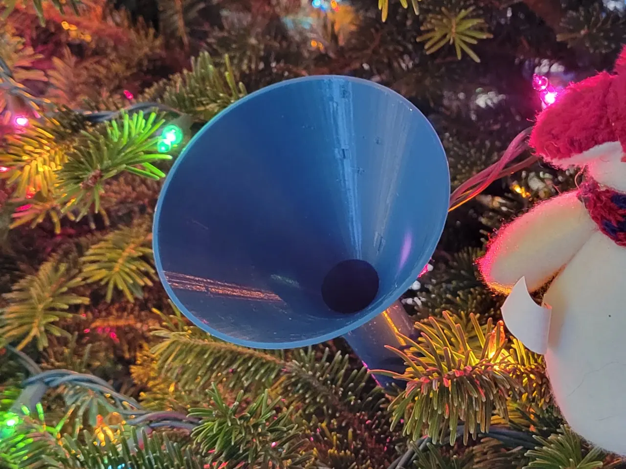 A render of a 3d printable multi part screw together watering funnel