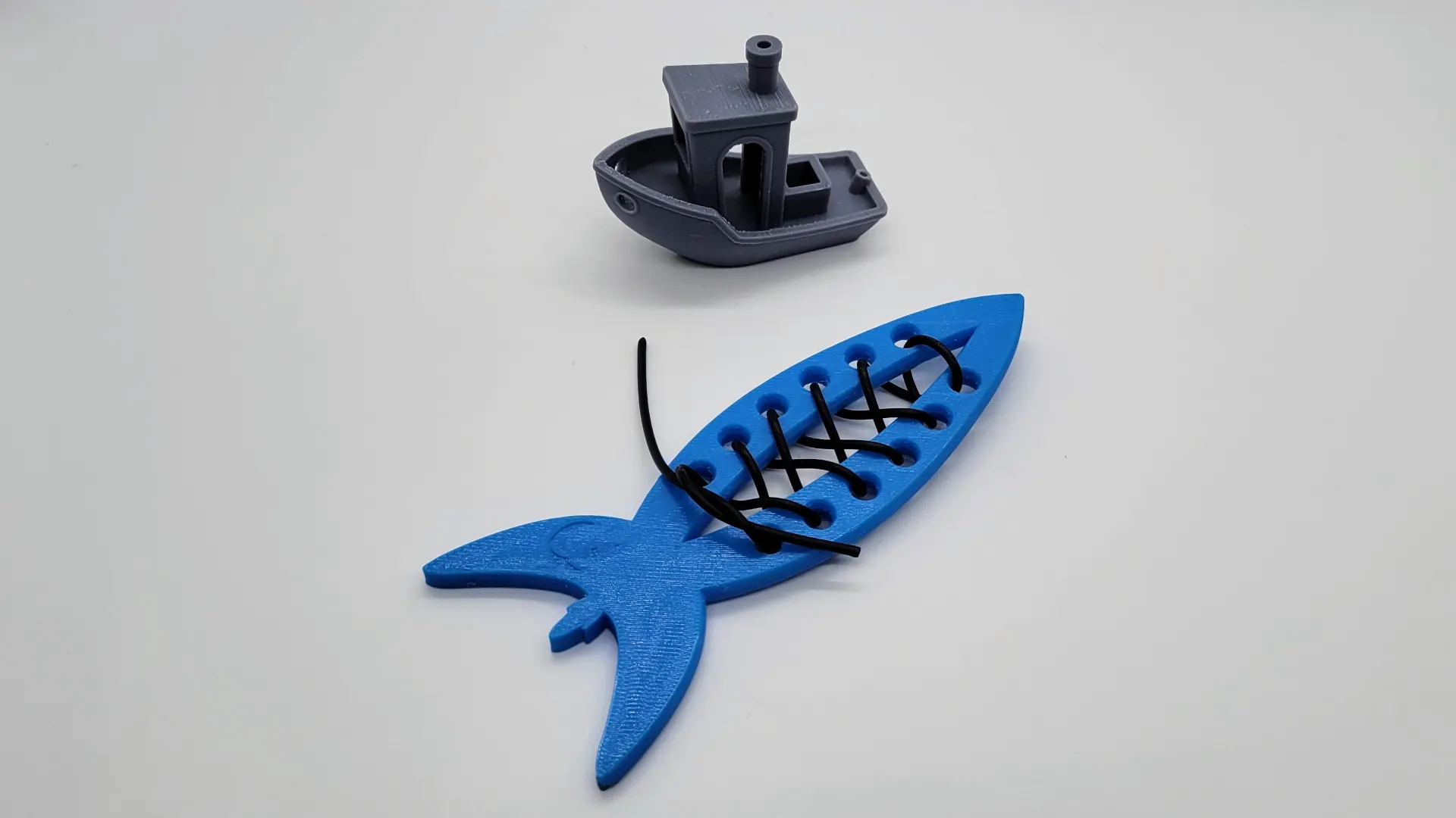 A render of a 3d printed educational toy shaped like a rocket for teaching children to tie