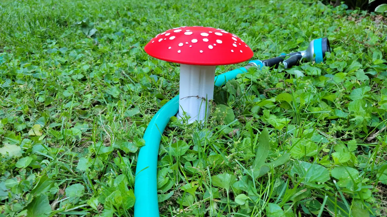 A render of a 3d printed mushroom shaped garden hose guard for plant beds