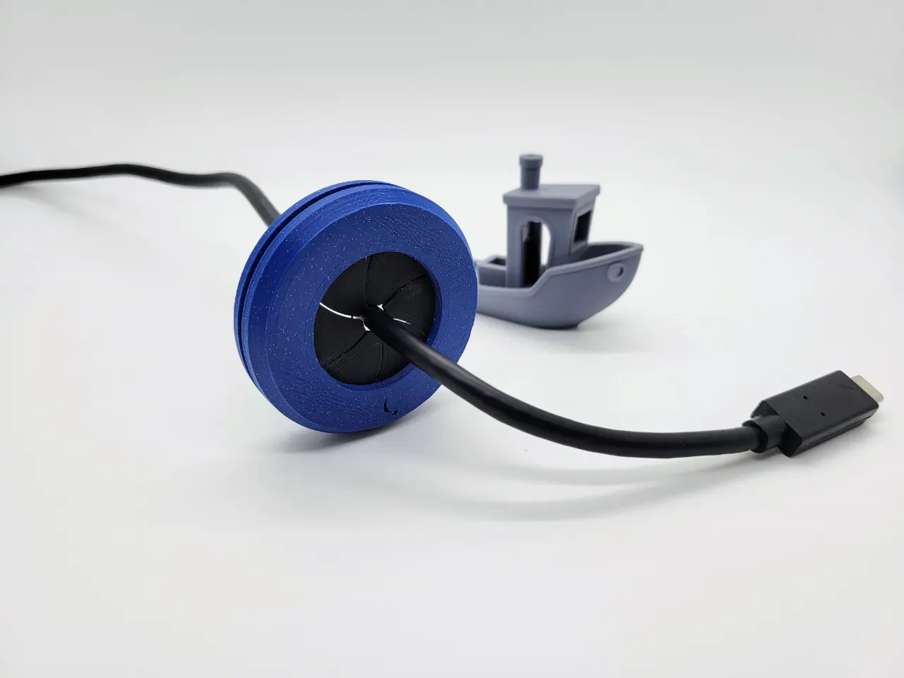 A render of a 3d printed cable pass through