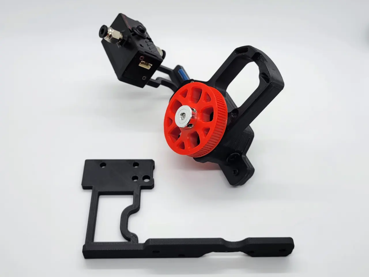 A picture of a 3d printed U shaped bracket with two screw holes