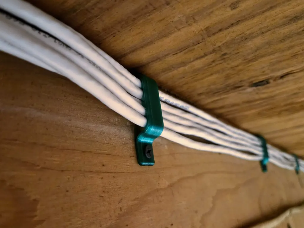 3D printed low-voltage cable bracket used for clean cable routing and mounting.