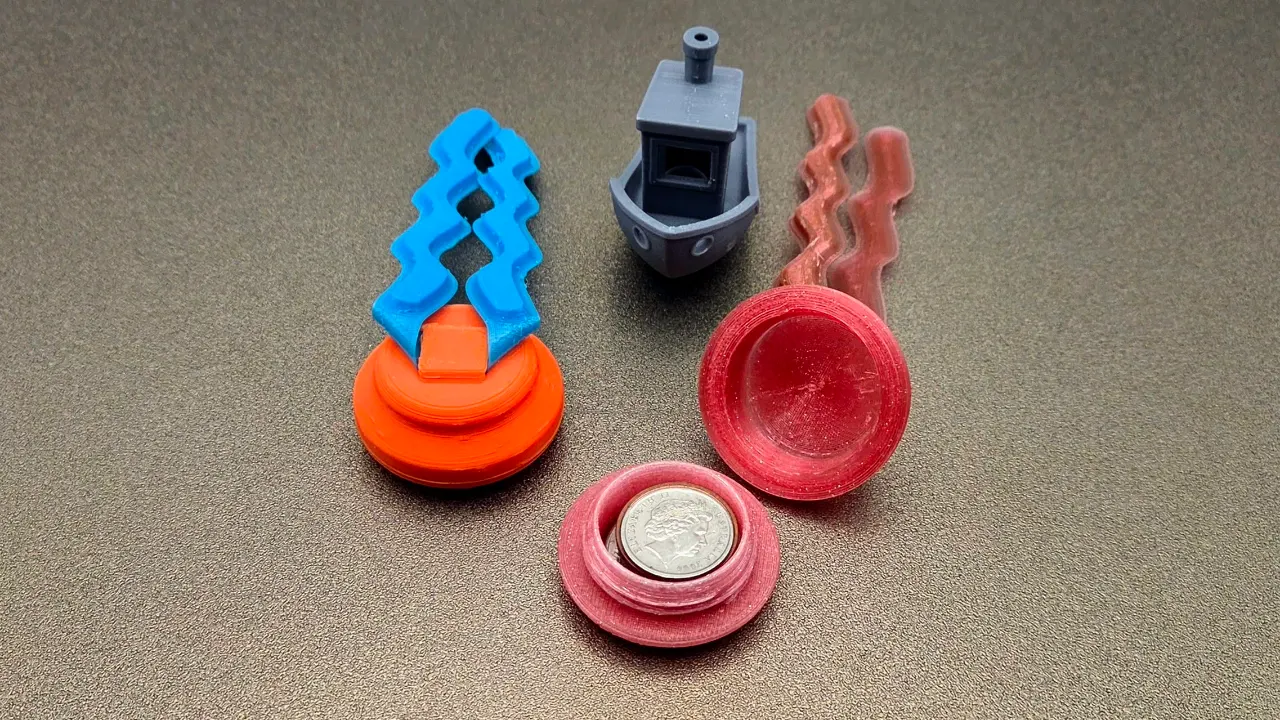 A render of several 3d printed geometrically shaped beads for teaching children to thread